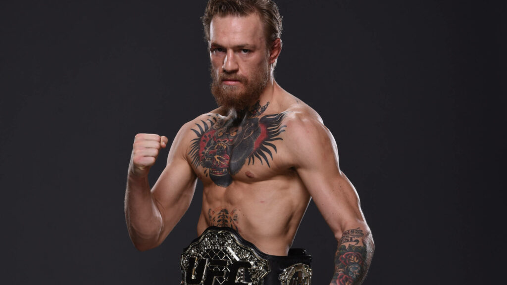 The Irish Champion: Conor McGregor Poses with UFC Belt in Stunning Wallpaper!
