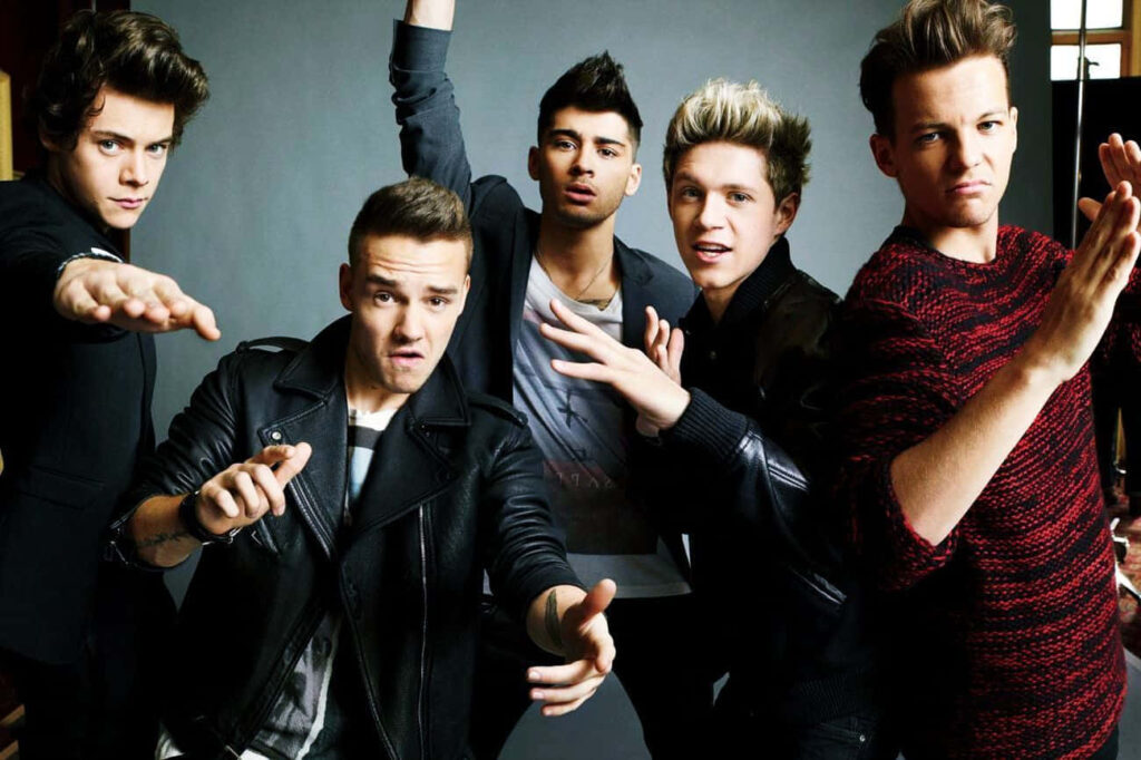 One Direction Singer Posing for Photo Background Wallpaper