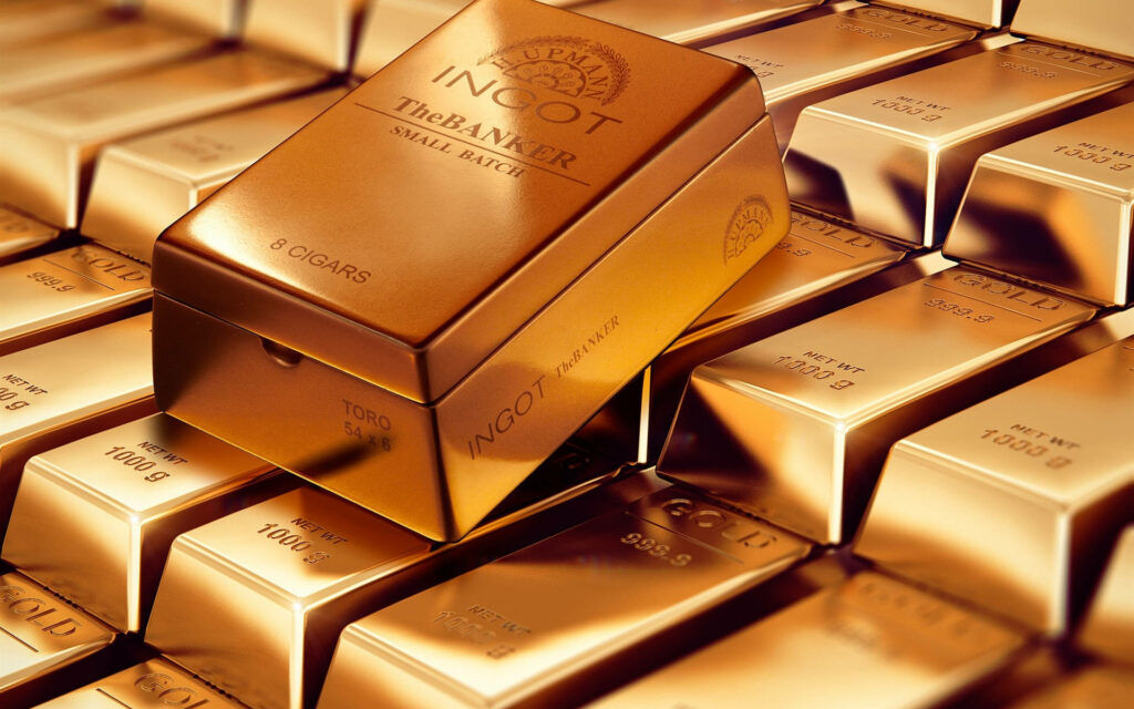 Golden wallpaper with H Upmann The Banker Ingot cigar box on glittering 1000g gold bars