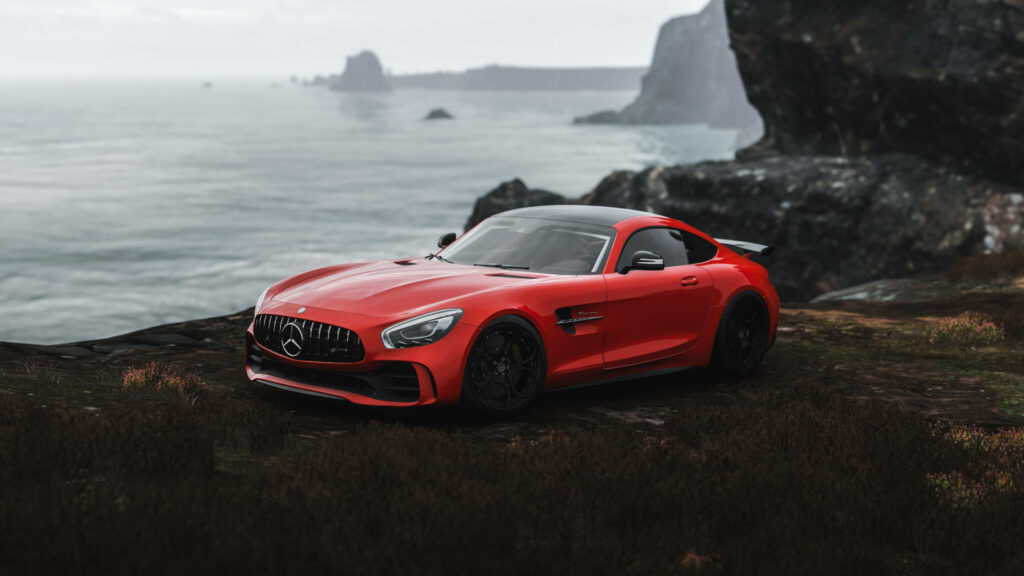 Jupiter Red Brilliance: The Mercedes AMG GTR Showstopper Against the Cliff's Edge Wallpaper