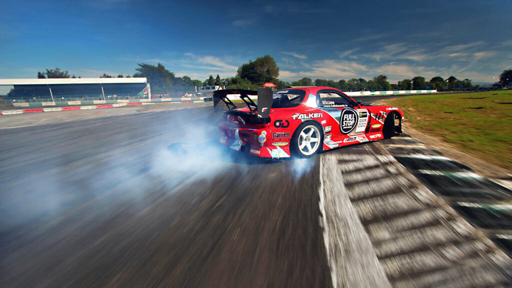 Red Mazda RX-7: Unleashing Drift Power on the Track, Painting the Sky with Smoke Wallpaper