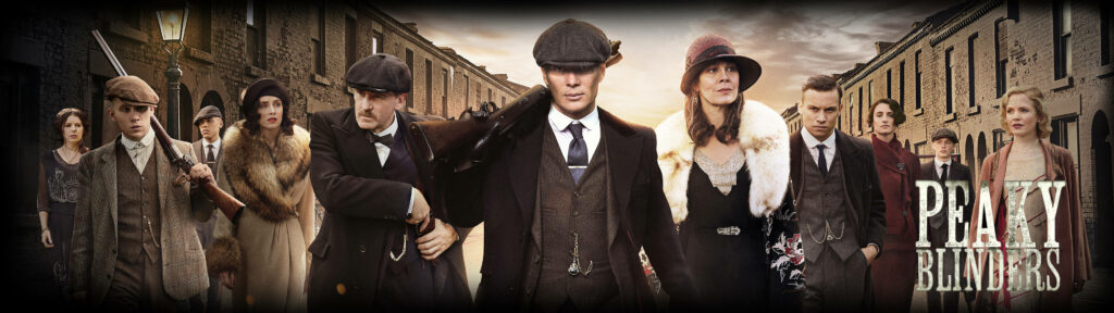 Gunslingers of Birmingham: Showcasing The Shelby Gangsters in a Captivating 8k Wallpaper