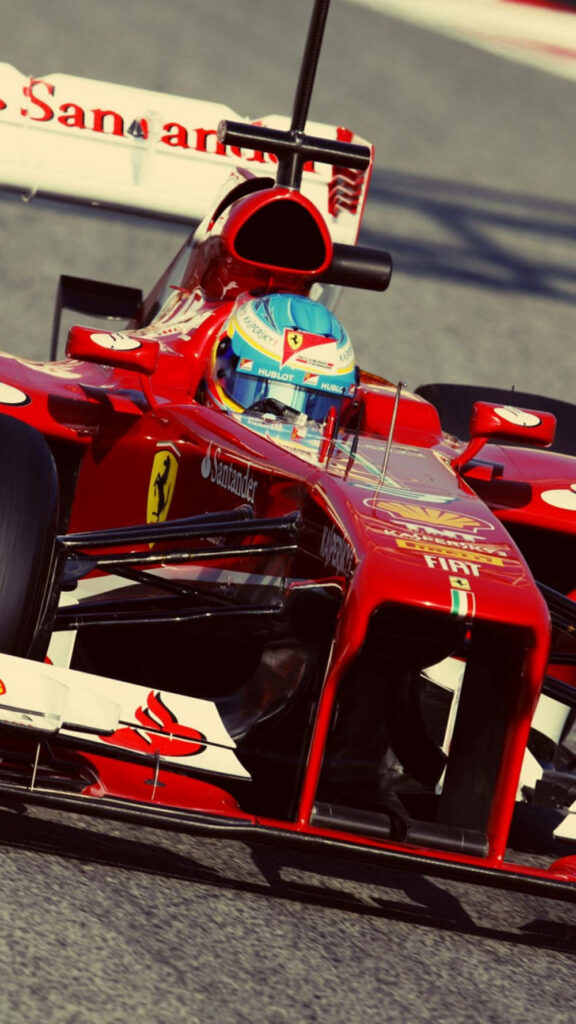 Ferrari's Formula One Ace: Immersed in the Intensity of Racing Wallpaper