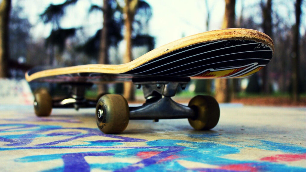 Flipping Perfection: Macro Skateboard Trick Wallpaper Captures the Thrill of the Sport