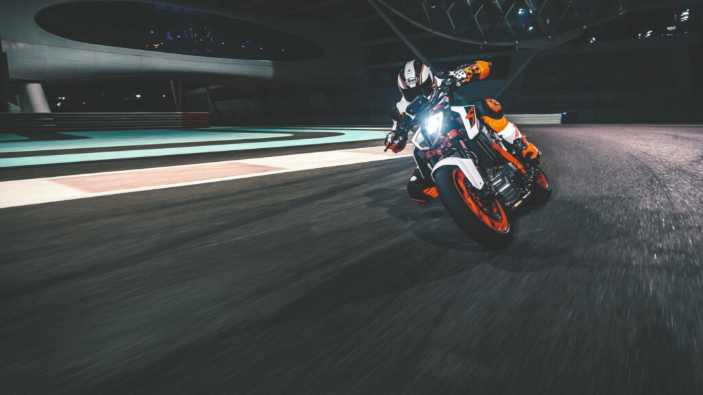 Riding the Oval: KTM Test Drive on Stadium Drive 4k Wallpaper