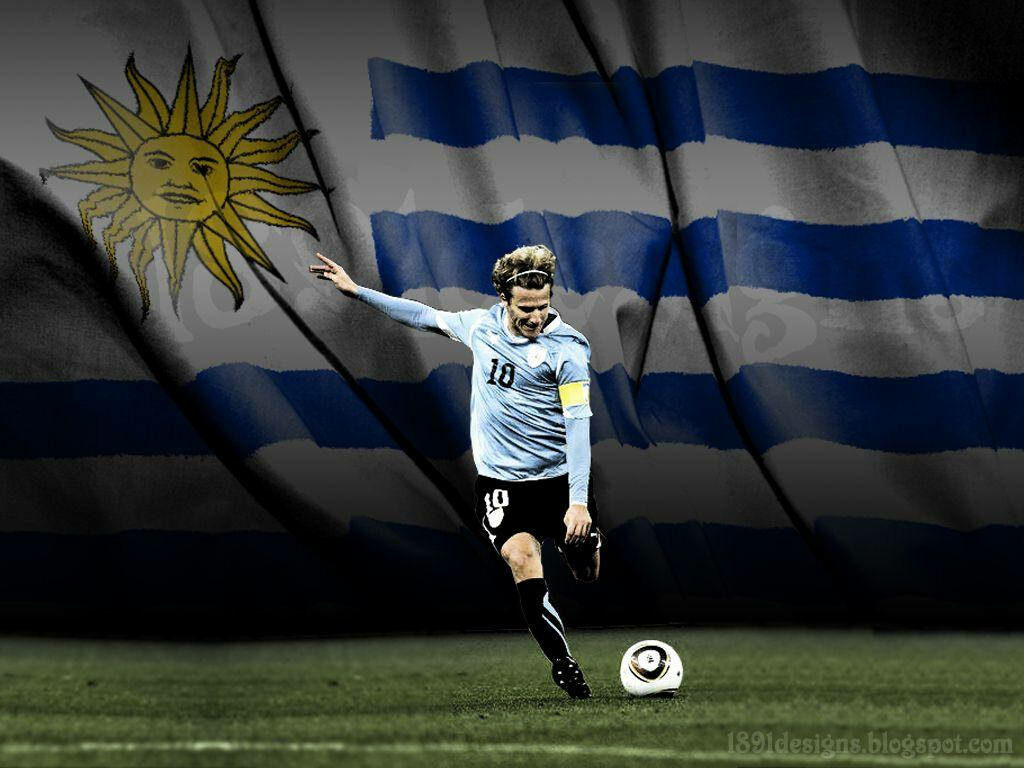 Uruguay's Football Legend Diego Forlán Immersed in the Pride of His Nation Wallpaper