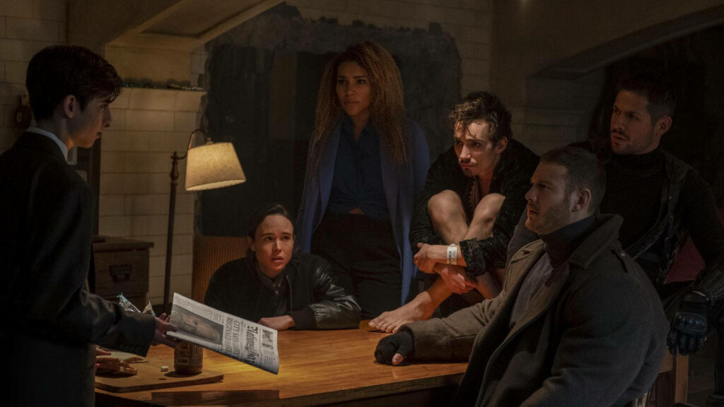 Umbrella Academy Wallpaper: Team Unity in Tense Discussion Background