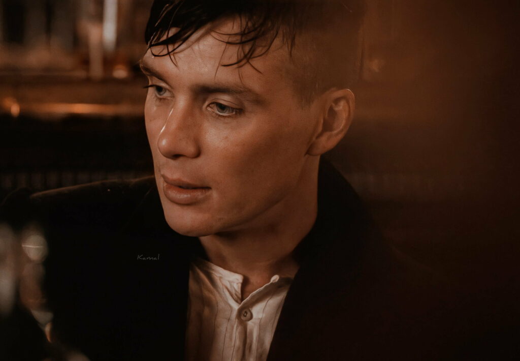 The Dashing Thomas Shelby Takes Center Stage in this Stunning 2K Wallpaper: Peaky Blinders Vibes and a Striking Nose Intensify the Captivating Image