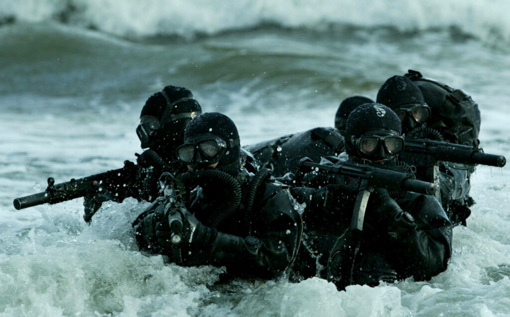 Raging Warriors: A Stunning Military Marine Wallpaper