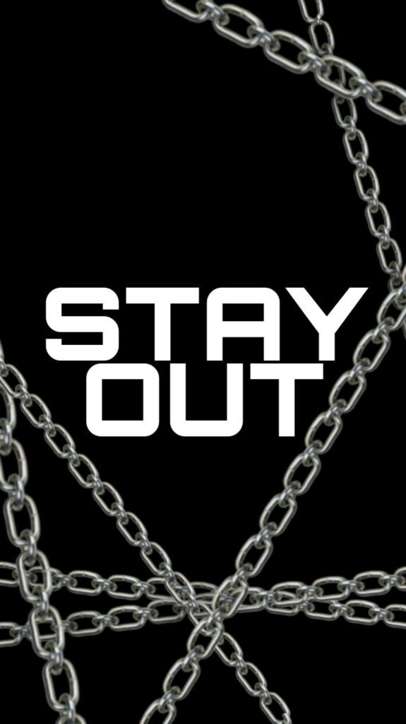 Intense Stay Out wallpaper with white bold text and metallic silver chains on black background
