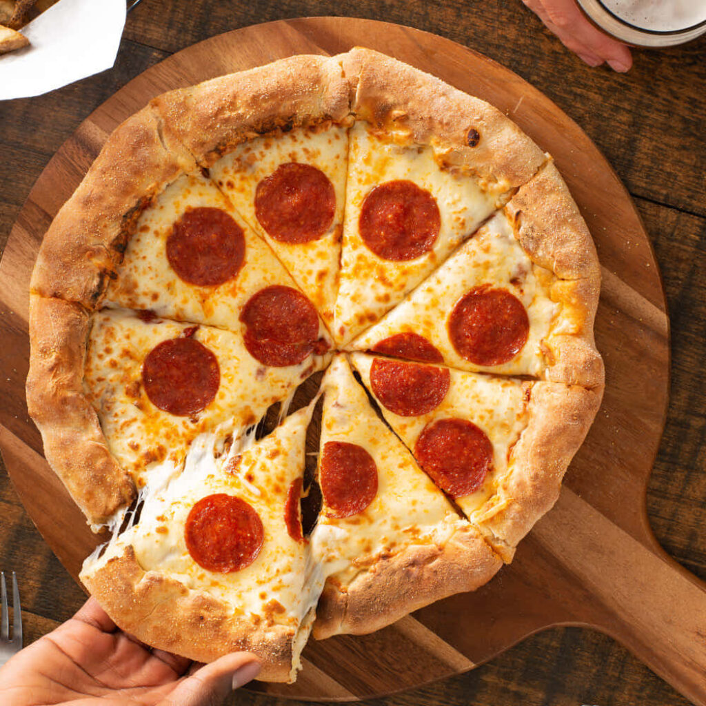 Thick-Crust Pepperoni Pizza Wallpaper: Melted Cheese & Perfectly Topped