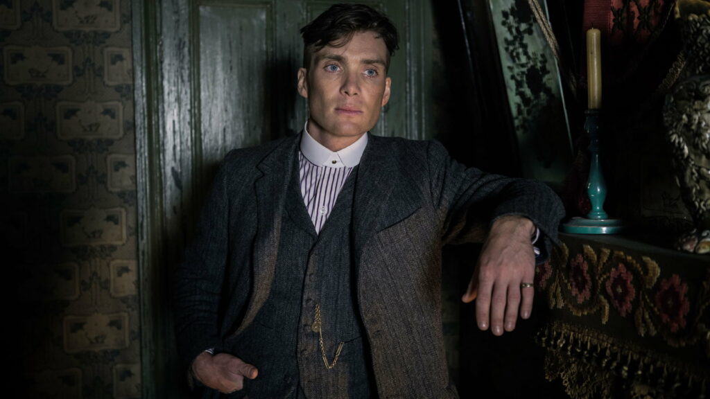 Dashing Thomas Shelby Dominates the Small Screen: A Captivating Peaky Blinders TV Show Wallpaper