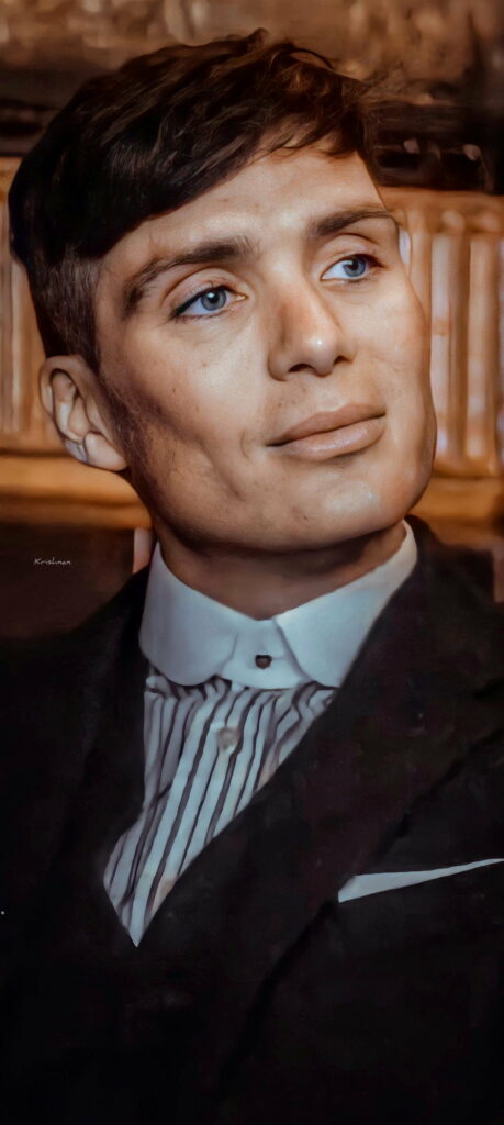 Grit and Tenacity Unveiled: Thomas Shelby Reveals His Intense Gaze in this Stunning HD Phone Wallpaper