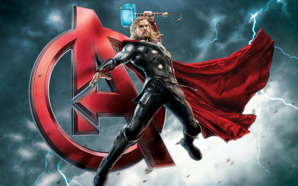 The Mighty Thor Unleashes His Power among Earth's Mightiest Heroes in this QHD Wallpaper Background Photo