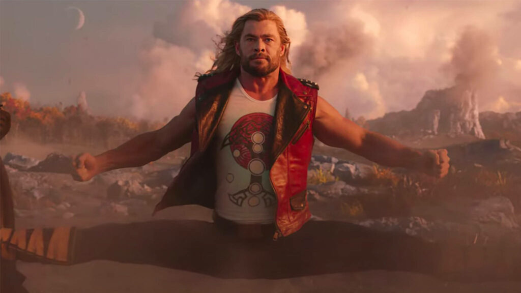 Thor performing an epic split showcasing strength and style in Thor Love and Thunder wallpaper