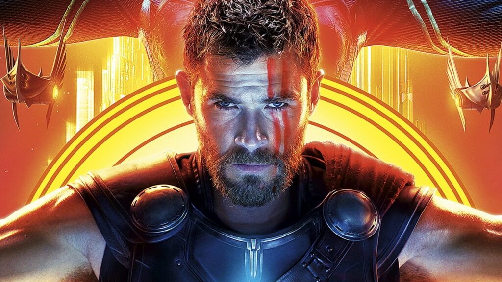 The Mighty Thor Unleashed: A Spectacular Movie Poster Featuring Chris Hemsworth in Thor Ragnarok Wallpaper