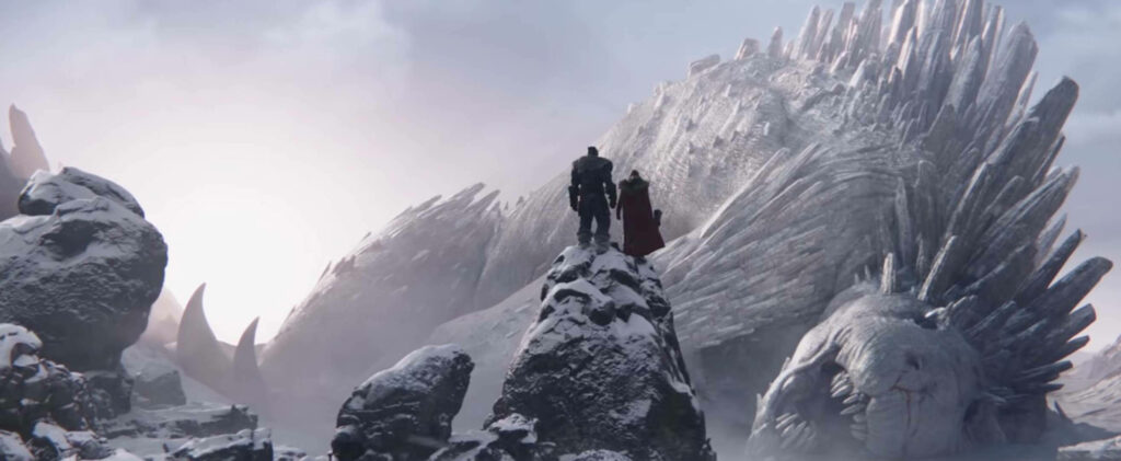 Thor and companion on snowy rocks overlooking the colossal fallen Falligar the Behemoth scene Wallpaper