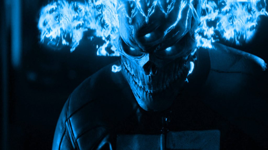 Three-eyed skull in blue flames dark fantasy wallpaper Ghost Rider style supernatural art