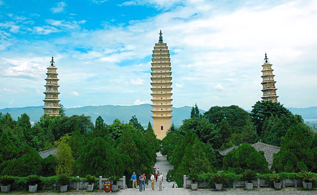Iconic Three Pagodas Wallpaper: Serenity in Lush Greenery