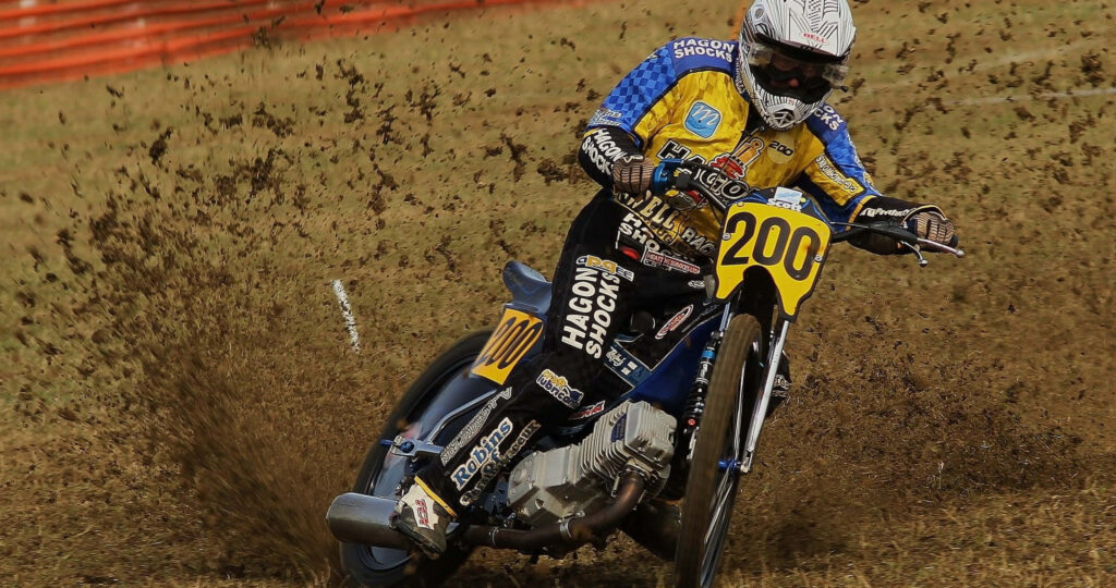 Thrilling 4K Motorcycle Racing Wallpaper: High-Energy Dirt Track Action