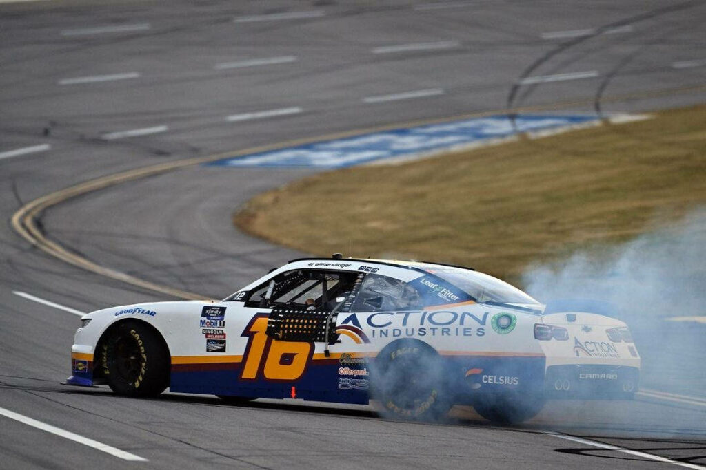 AJ Allmendinger Thrills: Action Wallpaper of Racing No. 16 Car