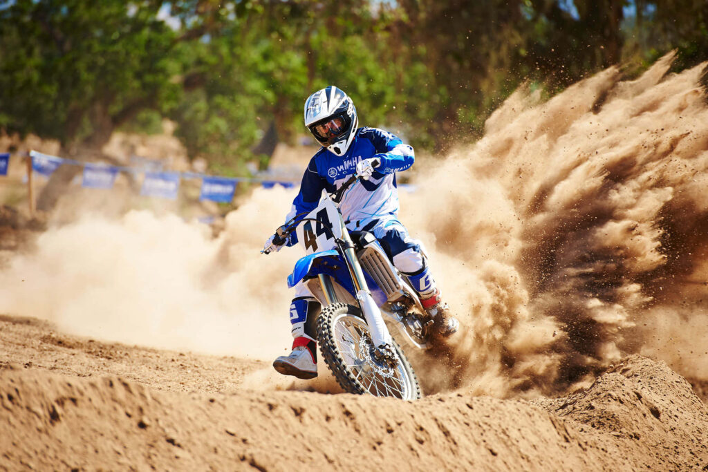 Adrenaline-Filled Dirt Bike Ride Wallpaper - Energizing Adventure