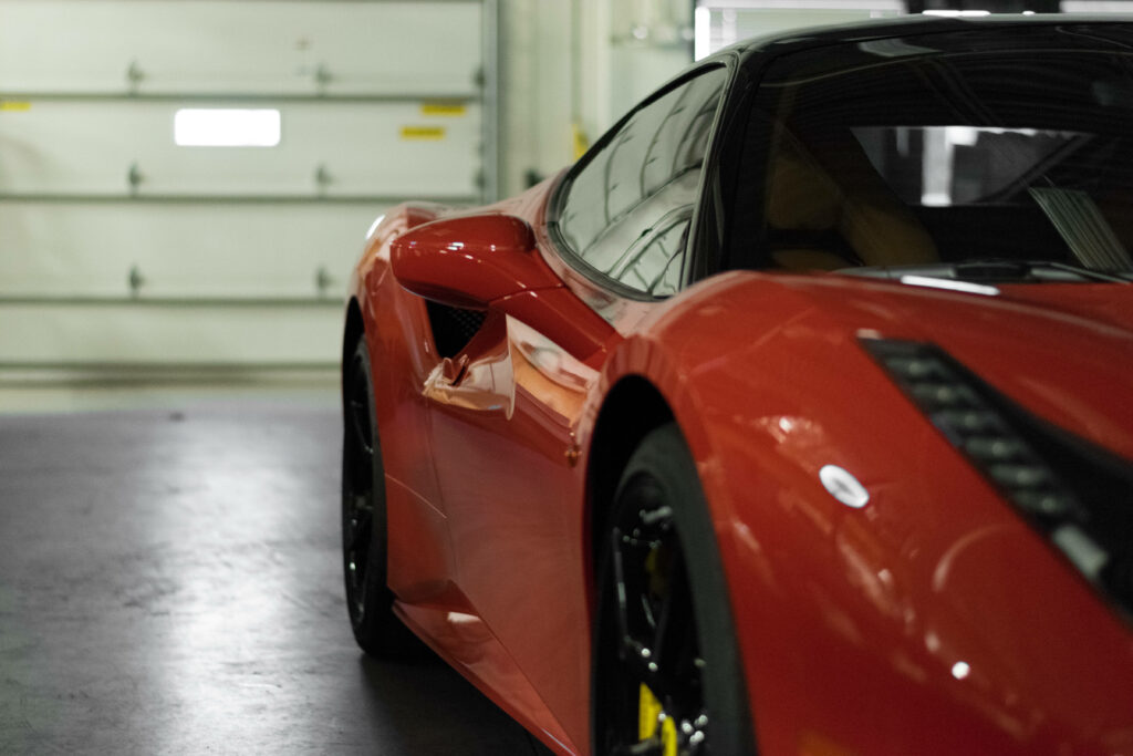 Unleashing the Unforgettable: Engage in the Exhilaration of Driving a Ferrari Supercar With its Striking Italian Aesthetics and Enthralling Performance Wallpaper