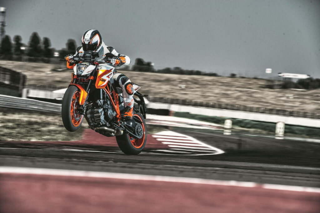 Thrilling Racer Jump Wallpaper: KTM Duke 200 in Action
