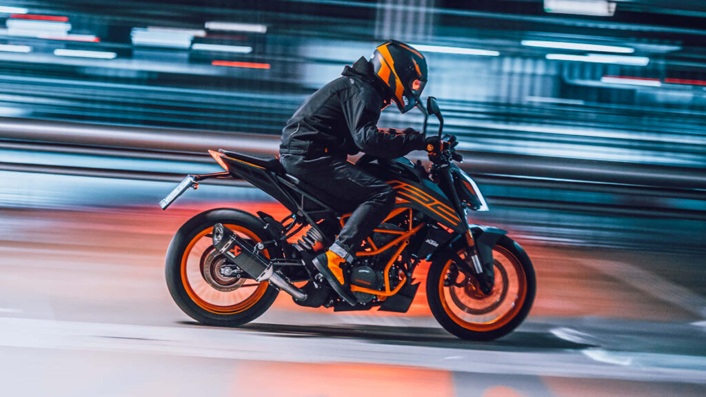 Thrilling KTM Duke Motorcycle Wallpaper with Motion Blur Effects