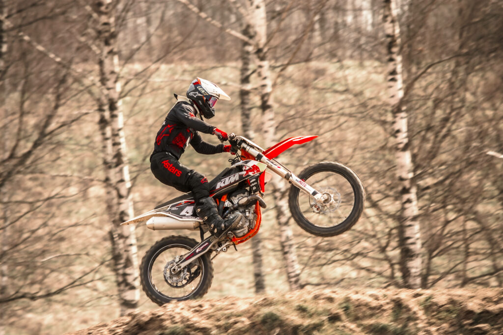 Thrilling KTM Bike Motocross Action Wallpaper Background