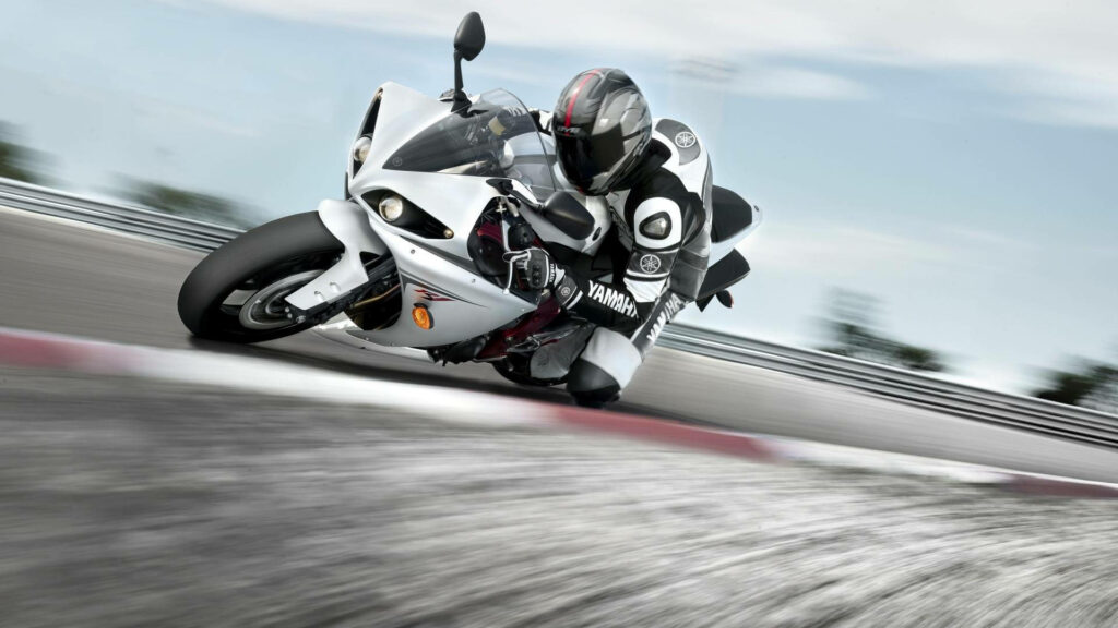 Thrilling Black & White Motorcycle Racing Wallpaper Background