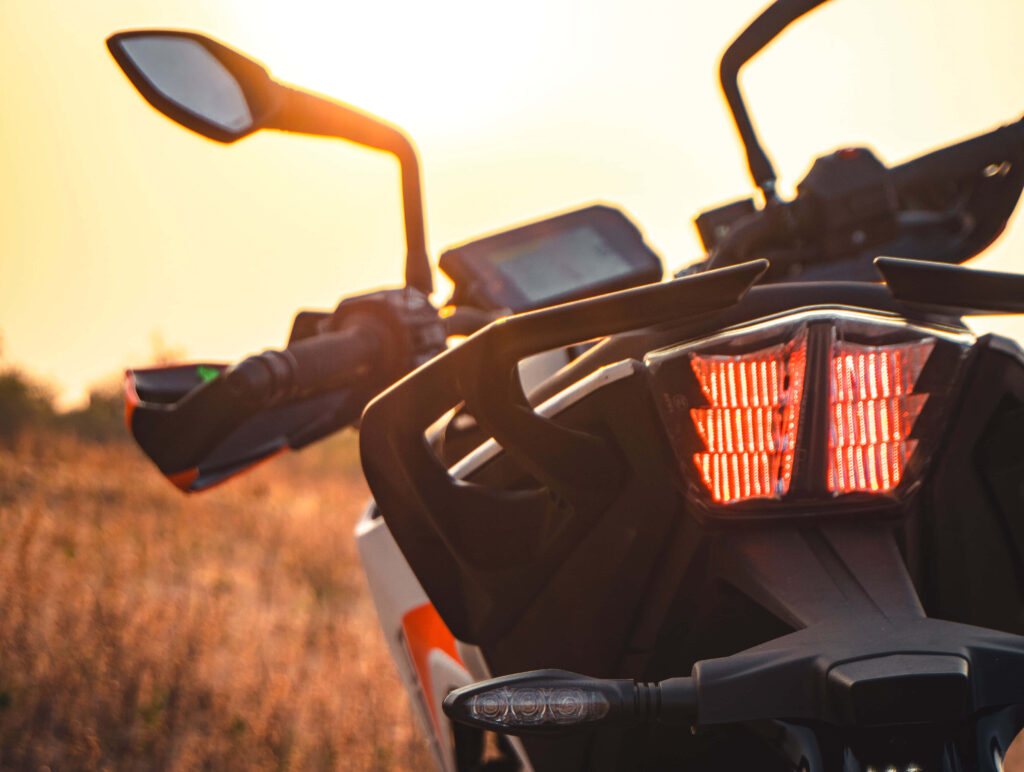 Dynamic Motorcycle Wallpaper: Sunset Rear View Adventure Background