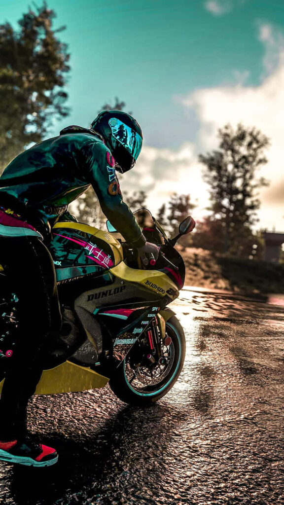 Thrilling Sports Bike Wallpaper: Adventure & Freedom Under Vibrant Sky
