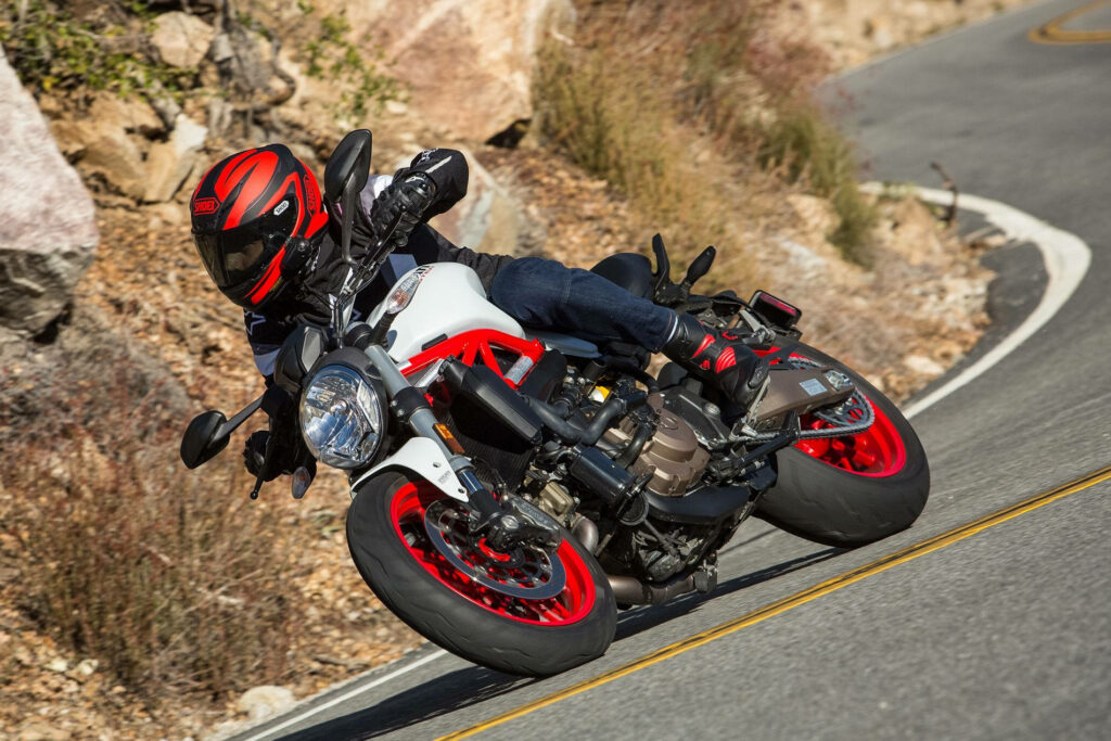 Thrilling Motorcycle Cornering Wallpaper: Speed & Adventure Shot