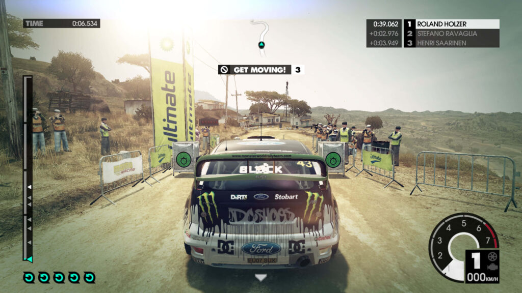 Dirt 3 Rally Car Ready at Start Line with Sponsor Logos - Competitive Rally Racing Scene Wallpaper