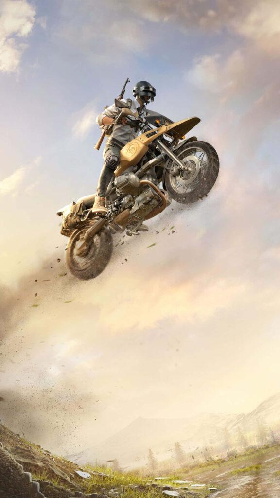 Epic Motorcycle Jump Wallpaper: Adventure in Scenic Mountains