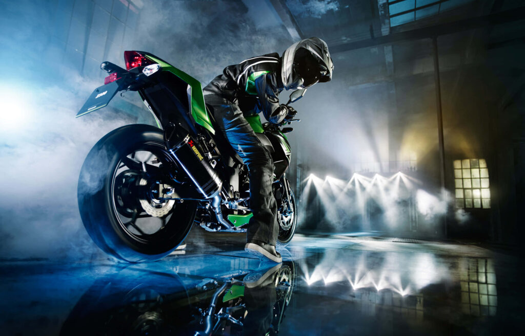 Thrilling Superbike Rider Wallpaper: Power, Speed & Dynamic Backdrop