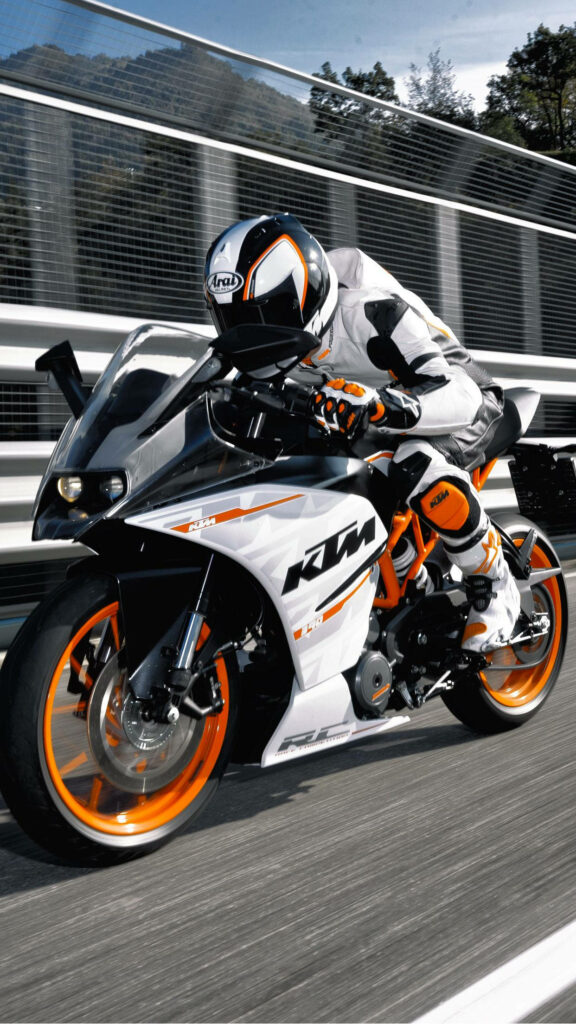 Thrilling White KTM Motorcycle Wallpaper with Rider in Racing Gear