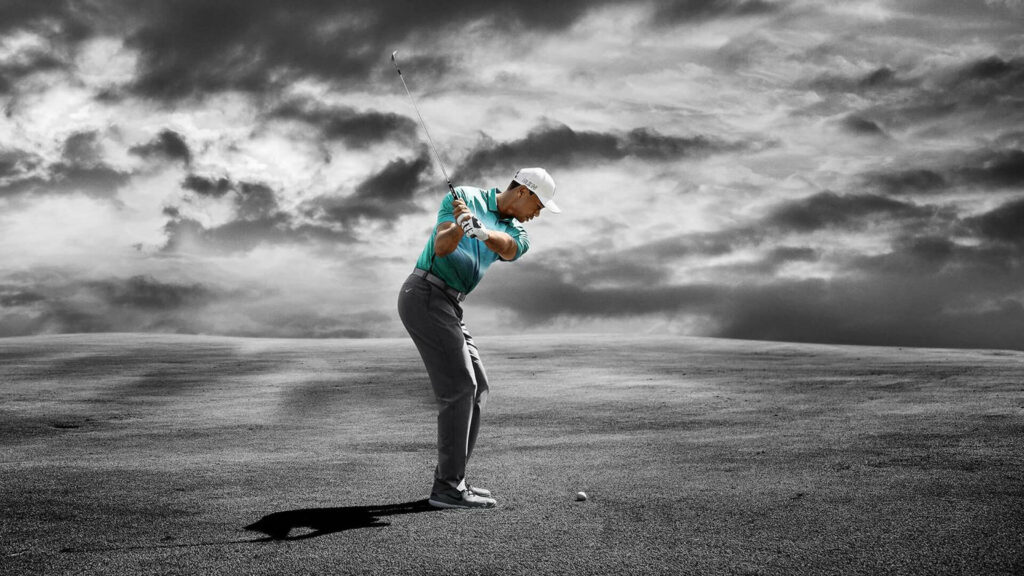 Tiger Woods mid-swing Nike Velocity wallpaper grayscale landscape vivid color signature style