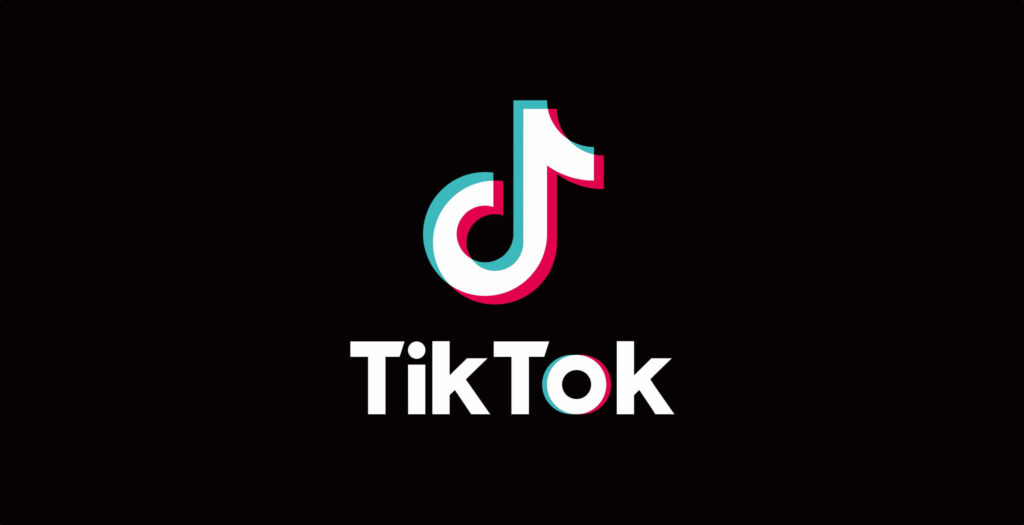Tricolored TikTok Logo Shines on Matte Black Background in Digital Vector Art Wallpaper