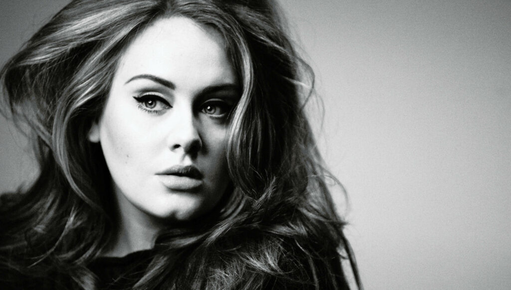 Timeless Adele: Striking Black-and-White Wallpaper Background