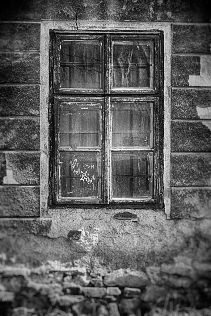 Rustic Black-and-White Image of a Weathered Nostalgic Window Wallpaper
