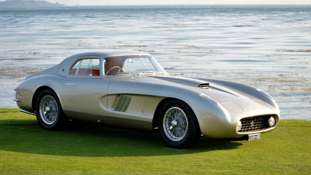 Timeless Elegance: Uniting Power, Heritage, and Style in this Iconic Prancing Horse Ferrari Wallpaper