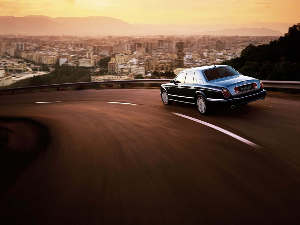 Bentley Arnage Gracing an Opulent Setting, Radiating Timeless Design and Unmatched Opulence Wallpaper