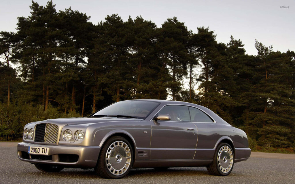Elegance of the Bentley Brooklands: A Timeless Masterpiece on a Serene Path Wallpaper