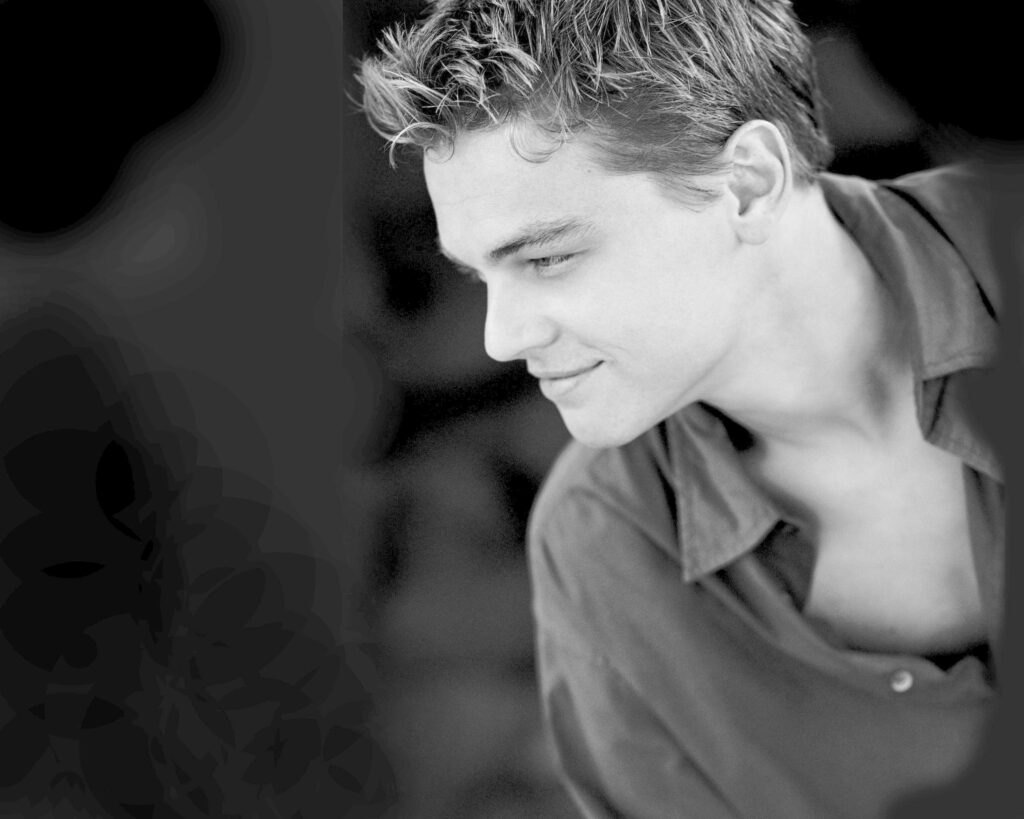 Timeless Charisma: Black-and-White Wallpaper of Leonardo DiCaprio