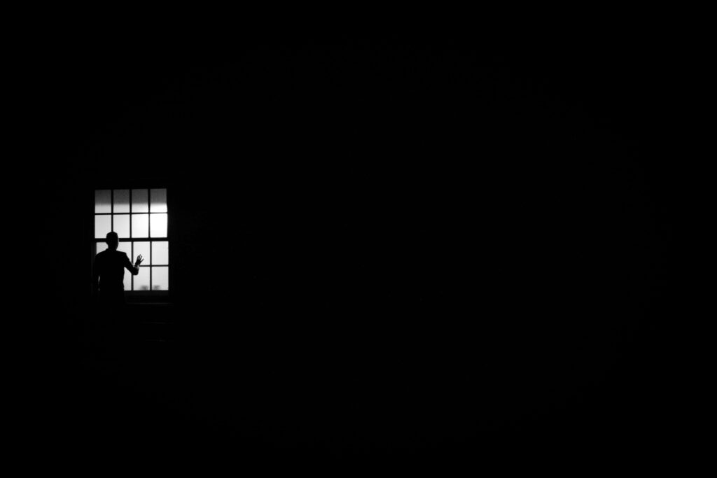 Timeless Minimalist Wallpaper: Silhouette By Softly Lit Window