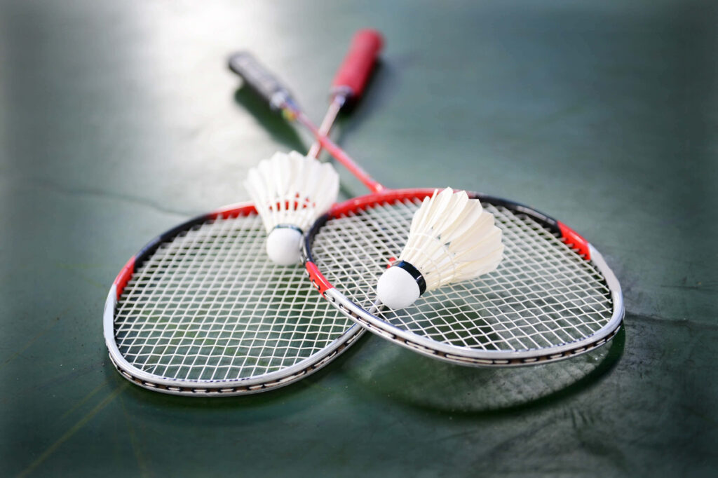 Action of Badminton: History and Thrills of this Timeless Racket Sport Wallpaper