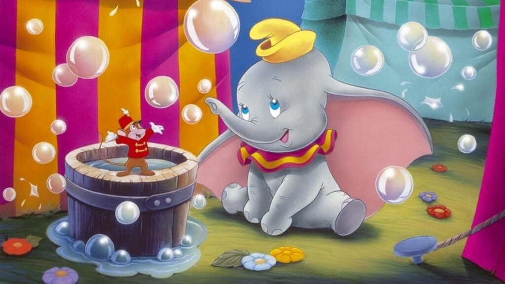 Timothy Q Mouse and Dumbo in pastel circus scene with colorful tents and playful bubbles wallpaper