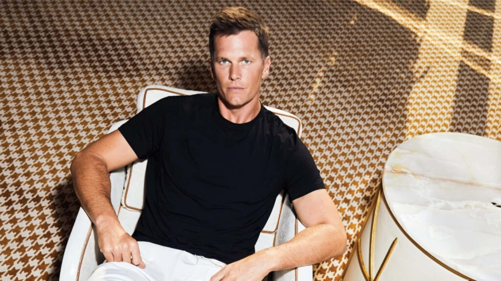 Stylish Tom Brady Wallpaper: Iconic Patriots QB in a Chic Setting